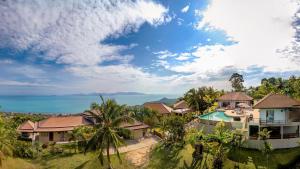 an aerial view of a villa with a resort at 5 Bedroom Sea View Villa Bubbles SDV376 By Samui Dream Villas in Mae Nam
