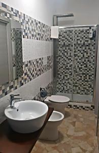 A bathroom at Notti Rosa B&B