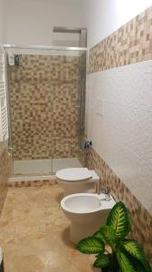 A bathroom at Notti Rosa B&B