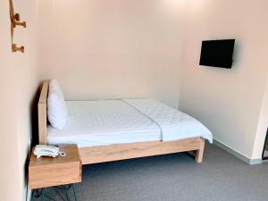 Ένα ή περισσότερα κρεβάτια σε δωμάτιο στο Hotel Mỹ Phương +102 φωτογραφίες