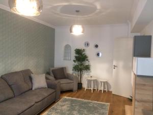 Χώρος καθιστικού στο Flori de Iulie Apartamente