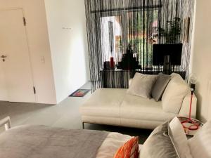 O zonă de relaxare la Modernes Studio auf der Sonnenterrasse