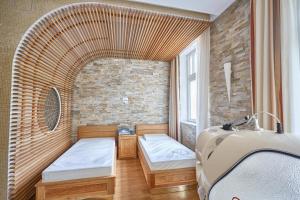 Postel nebo postele na pokoji v ubytování Apartment Villa Dionysus