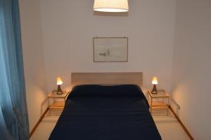 Postel nebo postele na pokoji v ubytování Casa Le Anfore