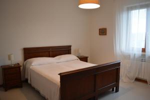 Postel nebo postele na pokoji v ubytování Casa Le Anfore
