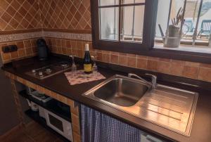 A kitchen or kitchenette at CR La Bohemia