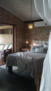 Säng eller sängar i ett rum på Villa Piccolo Di Mare