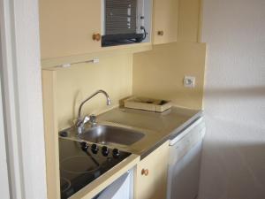 Kuchyň nebo kuchyňský kout v ubytování Fontaines Blanches 320