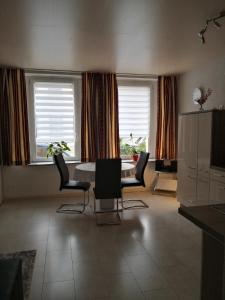 Un televizor și/sau centru de divertisment la Ferienwohnung Winzer +28 fotografii