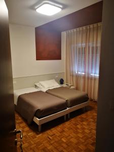 Postel nebo postele na pokoji v ubytování l'igloo b&b