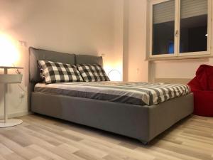 A bed or beds in a room at Ca Re Vespucci