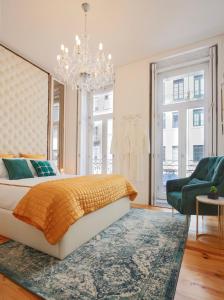 En eller flere senger på et rom på Esmeralda Luxury Apartment