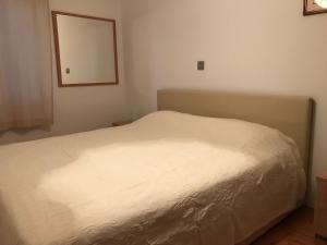 Кровать или кровати в номере Apartment Pula Center with private parking