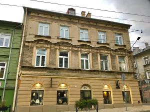 an old building on the corner of a street at Apartment - OLD TOWN - Cyrulicza in Lublin