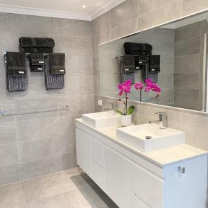 
A bathroom at Beach Charm Villa Suite
