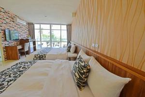 Letto o letti in una camera di Kenting 213 Homestay