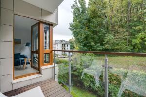 a balcony with a view of the street at Aquarius & FREE PARKING in Sopot