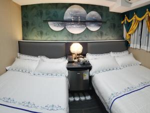 Letto o letti in una camera di Star City Hotel