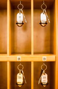 a row of wooden shelves with lights on them at Hotel am Rathaus in Heidelberg