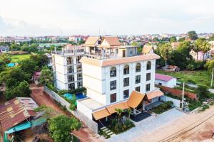 an aerial view of a building in a city at CENTRAL BLANCHE Residence in Siem Reap