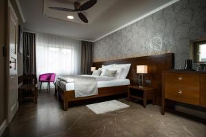 Posteľ alebo postele v izbe v ubytovaní Hotel Anna