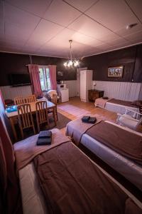 Postel nebo postele na pokoji v ubytování Arctic Guesthouse & Igloos