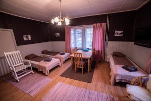 Postel nebo postele na pokoji v ubytování Arctic Guesthouse & Igloos