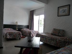 HOTEL KAMAL CITY CENTER客房内的一张或多张床位