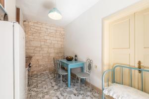 Postel nebo postele na pokoji v ubytování Villa Bunischa
