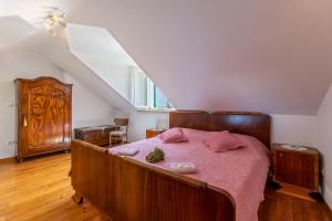 Postel nebo postele na pokoji v ubytování Villa Bunischa