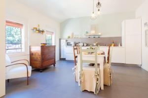 Virtuvė arba virtuvėlė apgyvendinimo įstaigoje Ferrara Be My Guest