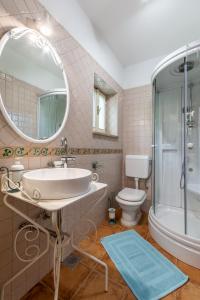 Koupelna v ubytování Villa Bunischa