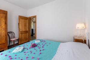 Postel nebo postele na pokoji v ubytování Villa Bunischa