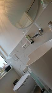 Ein Badezimmer in der Unterkunft Hotel in Herrenhausen