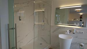 Ein Badezimmer in der Unterkunft Hotel in Herrenhausen