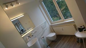 Ein Badezimmer in der Unterkunft Hotel in Herrenhausen