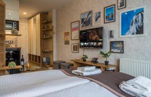 Μια τηλεόραση ή/και κέντρο ψυχαγωγίας στο Powderinn • Gudauri