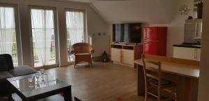 Kuchyň nebo kuchyňský kout v ubytování Moderne Apartments im Ferienpark auf Rügen