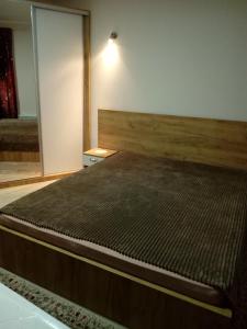 Rúm í herbergi á Divcibare apartmani Gavrić