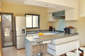 Cucina o angolo cottura di Athena Villas by Fine & Country