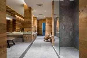 Postel nebo postele na pokoji v ubytování Hotel Baita Dei Pini