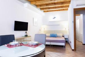 TV a/nebo společenská místnost v ubytování Residence Diaz