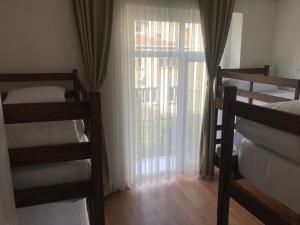 Postel nebo postele na pokoji v ubytování Kalkedon Hostel