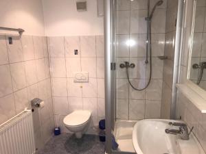 Koupelna v ubytování Ferienwohnung Asum + 18 fotografií