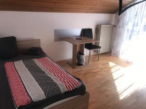 Postel nebo postele na pokoji v ubytování Ferienwohnung Asum