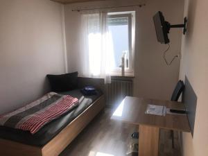 Postel nebo postele na pokoji v ubytování Ferienwohnung Asum