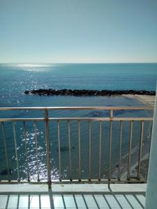 a view of the ocean from the balcony of a condo at APPARTAMENTO CON TERRAZZA SUL MARE in Sciacca