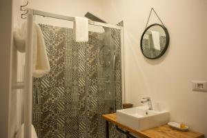Kúpeľňa v ubytovaní Officina Rooms + 37 fotografií