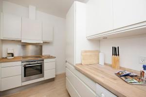 Kuchyň nebo kuchyňský kout v ubytování Hotel 9 små hjem