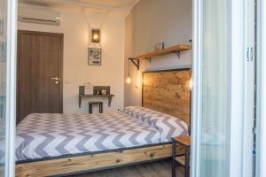 Posteľ alebo postele v izbe v ubytovaní Officina Rooms
